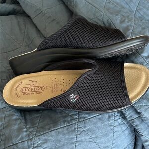 New, no tag.  Fly Flot slides.